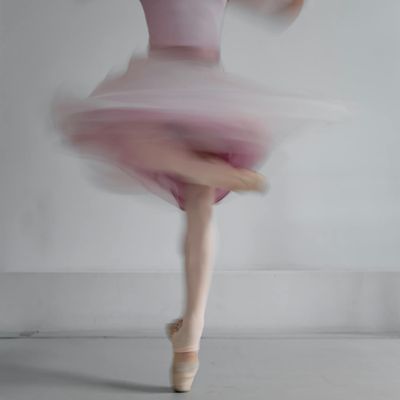 Dynamic blur of a person performing a fluid movement.